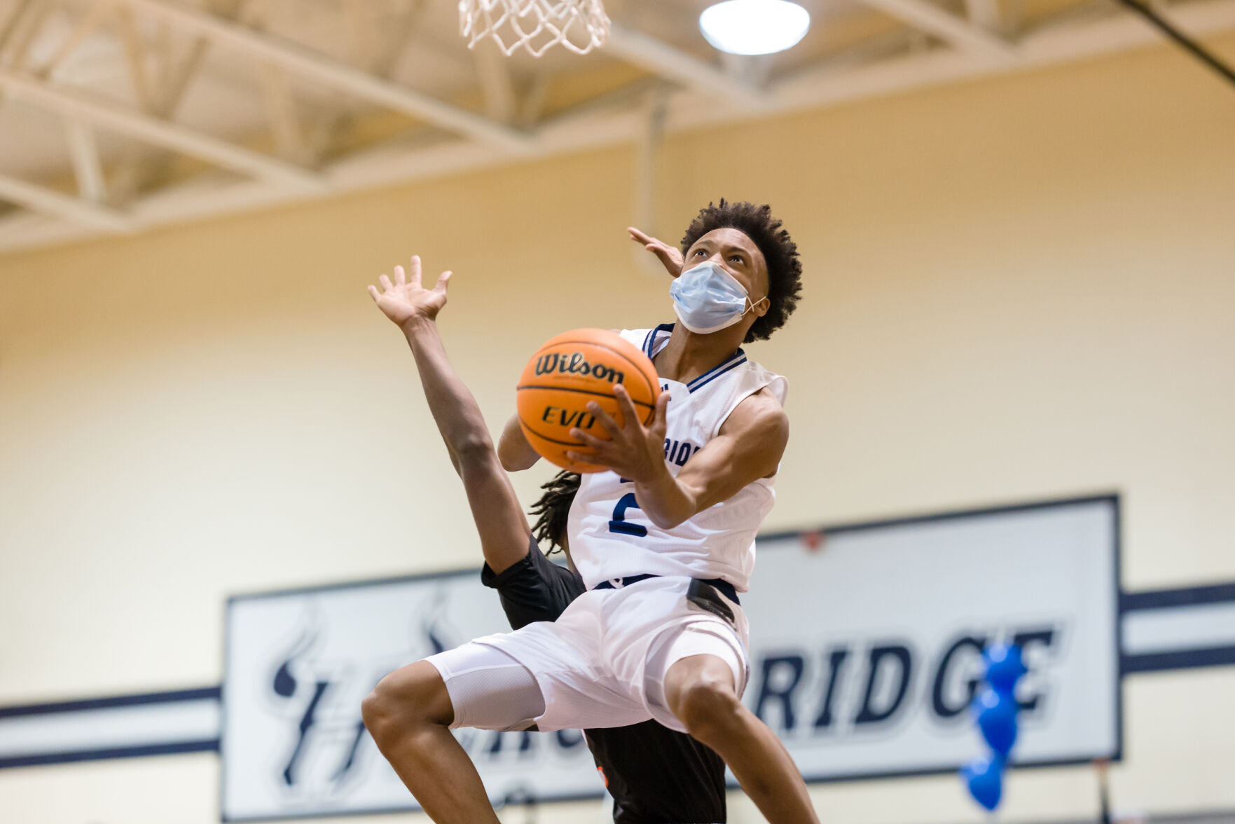 Boys Basketball: Hickory Ridge RaginÕ Bulls defeated the Northwest Cabarrus Trojans 64-56.